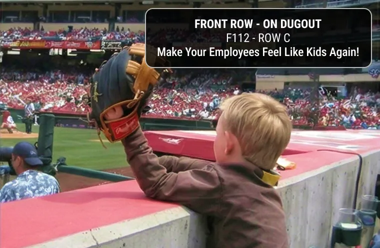 Young fan in the front row on the dugout at Angel Stadium — Section F112, Row C